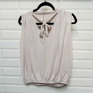 Free People Women’s Cream Flowy Sleeveless Blouse with Necktie